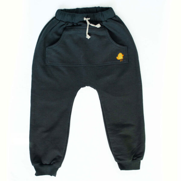 a black pants with a yellow bird on it