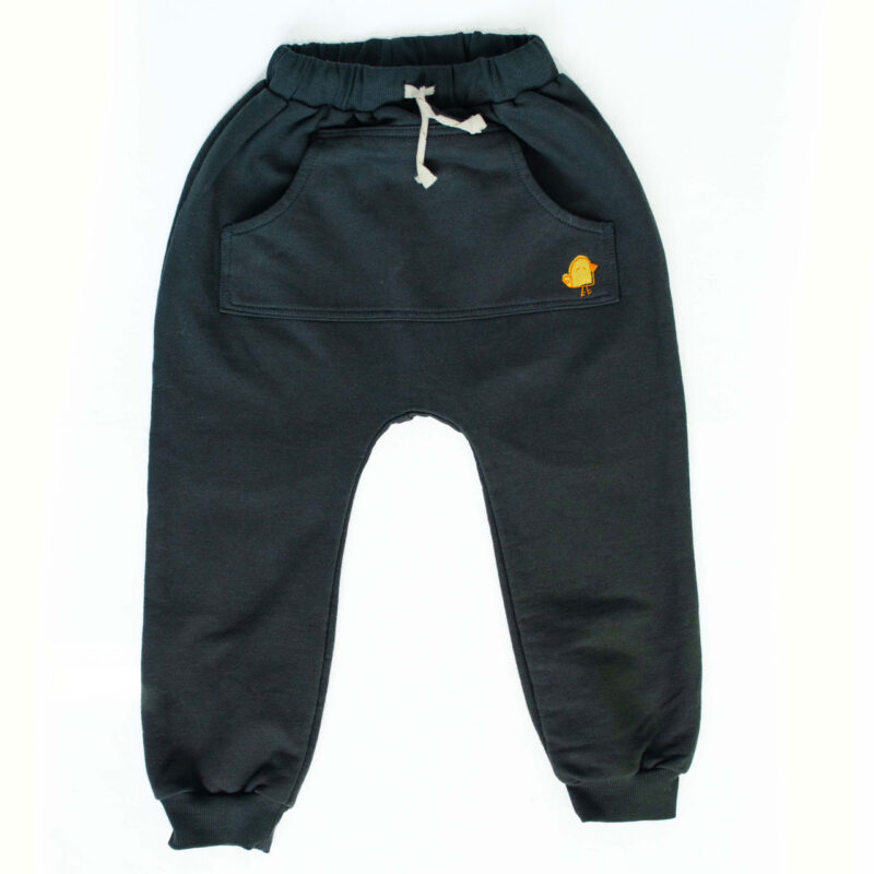 a black pants with a yellow bird on it